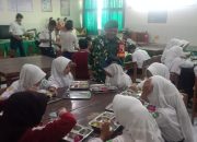 Sukseskan Program Pemerintah Babinsa 0822 Dampingi SPPG Bondowoso Distribusikan 2.414 Paket Makanan Bergizi